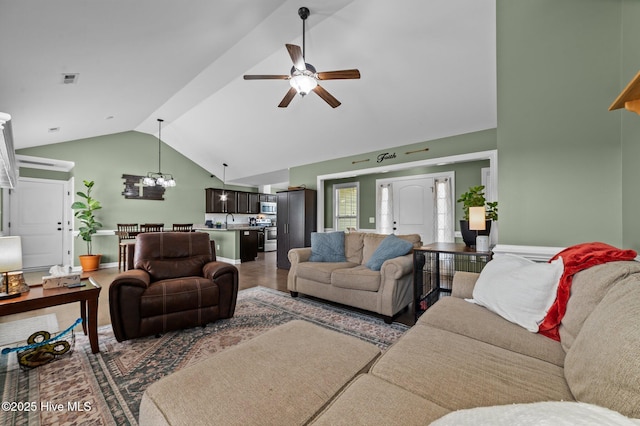 1763 Oak Pointe Dr, Greenville, NC 27834 - living room with a ceiling fan and high vaulted ceiling