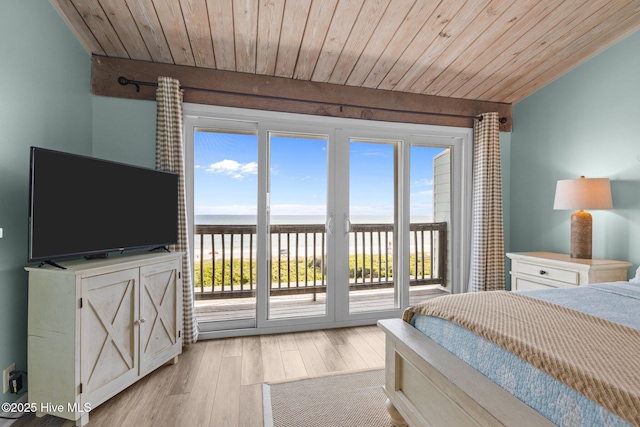 535 Salter Path Rd Unit 3, Pine Knoll Shores, NC 28512 - bedroom featuring access to exterior, wood ceiling, light wood finished floors, and multiple windows