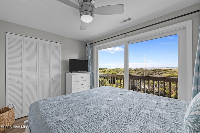 535 Salter Path Rd Unit 3, Pine Knoll Shores, NC 28512 - bedroom featuring multiple windows, wood finished floors, access to outside, and a closet