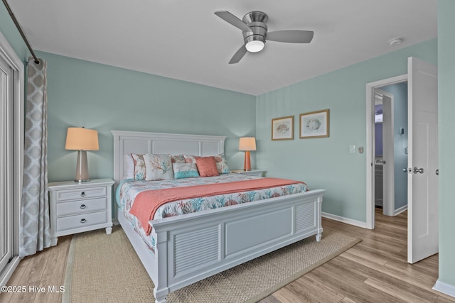 535 Salter Path Rd Unit 3, Pine Knoll Shores, NC 28512 - bedroom with wood finished floors, ceiling fan, and baseboards