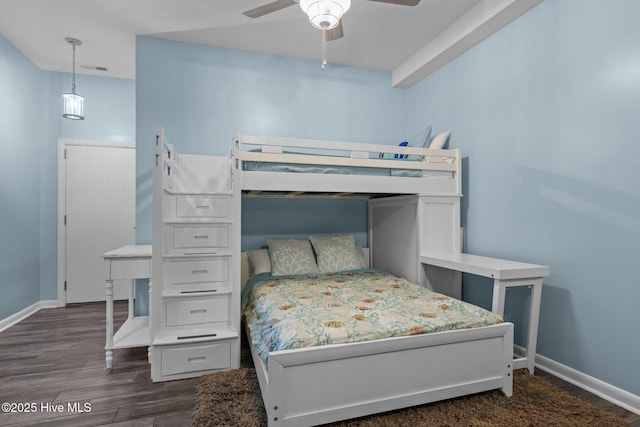535 Salter Path Rd Unit 3, Pine Knoll Shores, NC 28512 - bedroom with dark wood-style floors, baseboards, and a ceiling fan