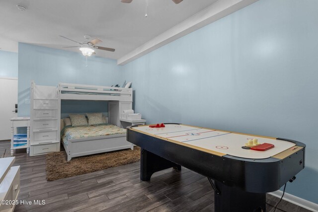 535 Salter Path Rd Unit 3, Pine Knoll Shores, NC 28512 - bedroom featuring dark wood-type flooring and a ceiling fan
