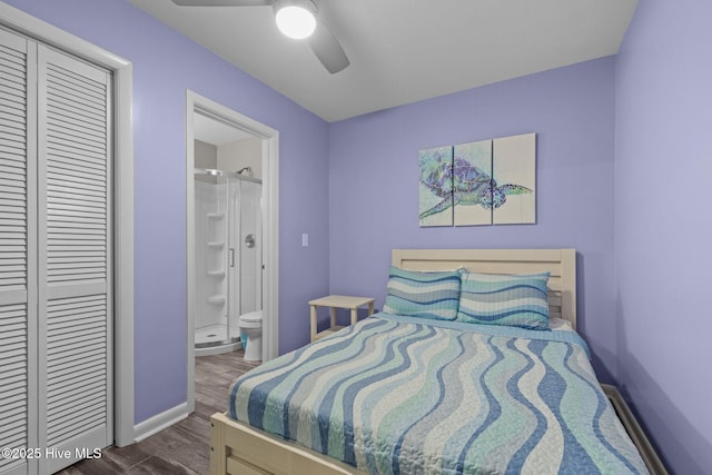 535 Salter Path Rd Unit 3, Pine Knoll Shores, NC 28512 - bedroom featuring dark wood-style floors, a closet, baseboards, ensuite bathroom, and a ceiling fan