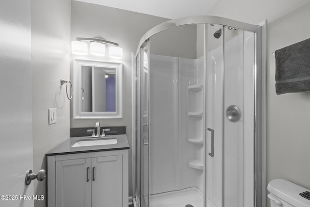 535 Salter Path Rd Unit 3, Pine Knoll Shores, NC 28512 - full bathroom with toilet, a shower stall, and vanity
