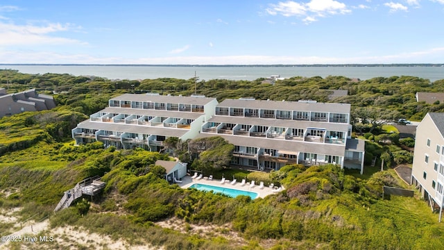 535 Salter Path Rd Unit 3, Pine Knoll Shores, NC 28512 - bird's eye view of a pool, a nearby body of water, and apartment complex