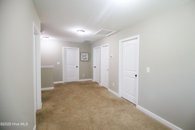 103 Stafford Dr, Pikeville, NC 27863 - hallway featuring attic access, carpet floors, and baseboards
