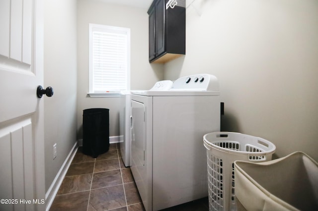 103 Stafford Dr, Pikeville, NC 27863 - washroom with cabinet space, separate washer and dryer, baseboards, and dark tile patterned floors