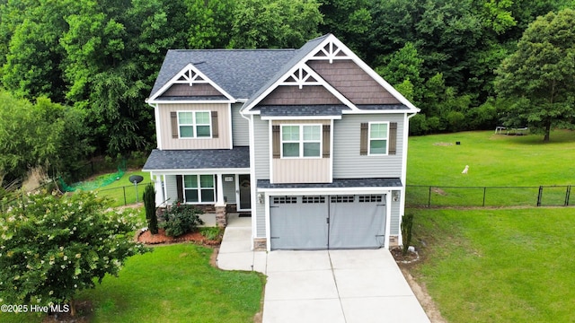 103 Stafford Dr, Pikeville, NC 27863 - craftsman-style house featuring driveway, a garage, board and batten siding, a shingled roof, and stone siding
