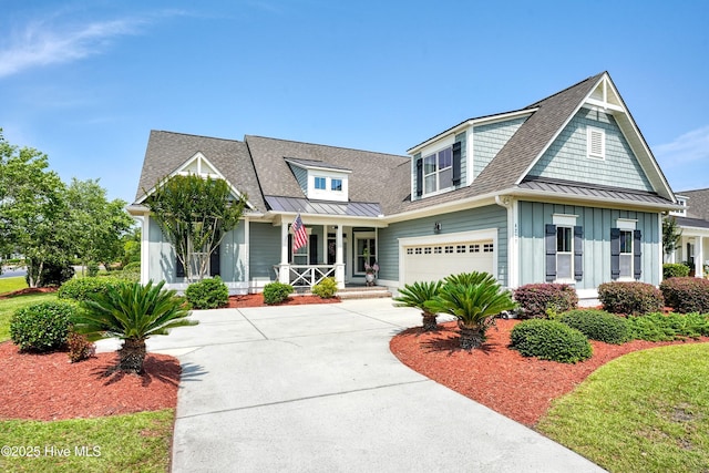 4277 Kingston Ct, Southport, NC 28461 - view of front of property with a porch, a standing seam roof, board and batten siding, and concrete driveway