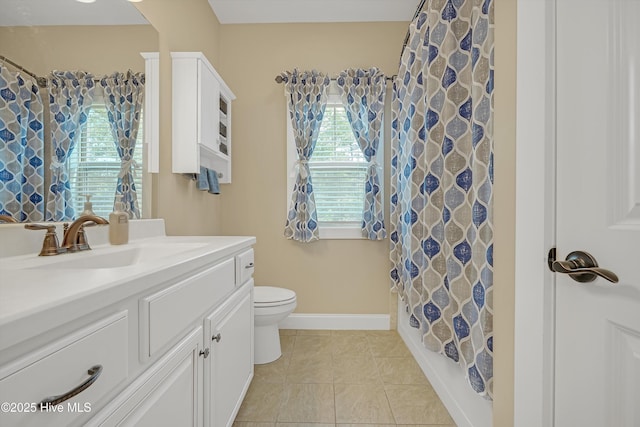 4277 Kingston Ct, Southport, NC 28461 - bathroom with vanity, toilet, tile patterned flooring, and baseboards