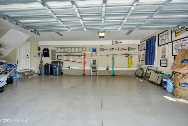 4277 Kingston Ct, Southport, NC 28461 - garage featuring a garage door opener and electric panel