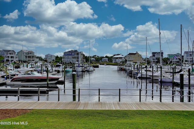 4277 Kingston Ct, Southport, NC 28461 - dock area with a lawn, a water view, and a residential view