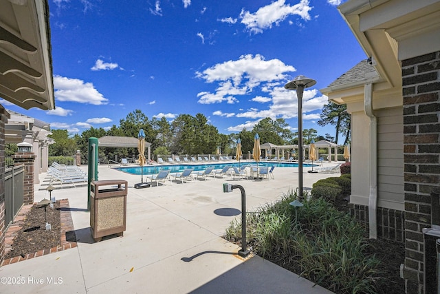 4277 Kingston Ct, Southport, NC 28461 - community pool with a patio