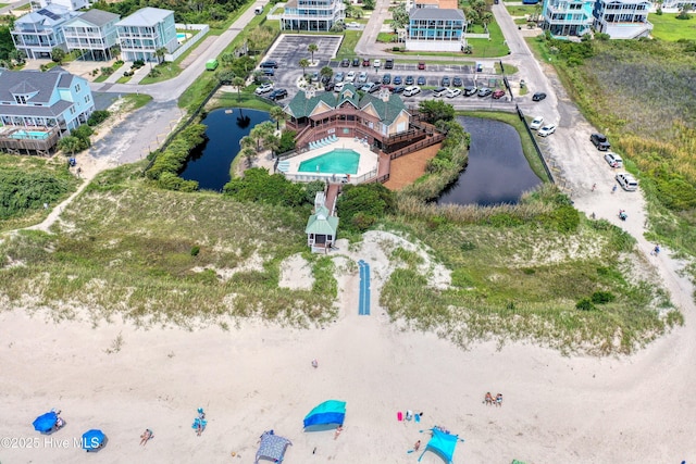 4277 Kingston Ct, Southport, NC 28461 - aerial view of a pool area and a nearby body of water