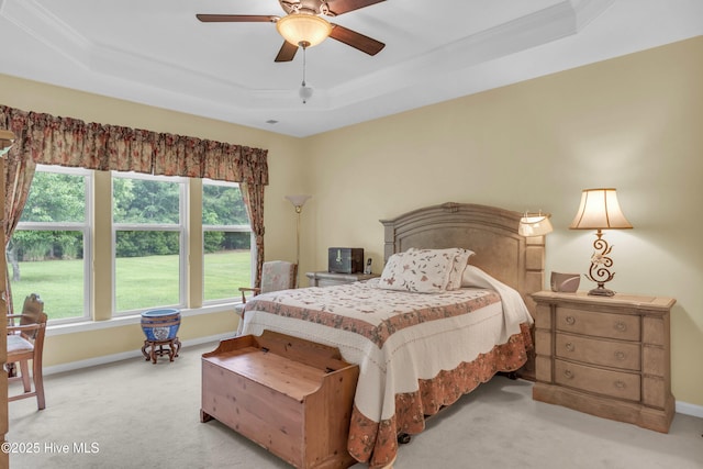 5170 Swashbuckler Way, Southport, NC 28461 - bedroom featuring a raised ceiling, light carpet, ornamental molding, and baseboards