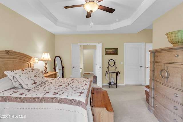 5170 Swashbuckler Way, Southport, NC 28461 - bedroom featuring light carpet, a tray ceiling, crown molding, baseboards, and a ceiling fan