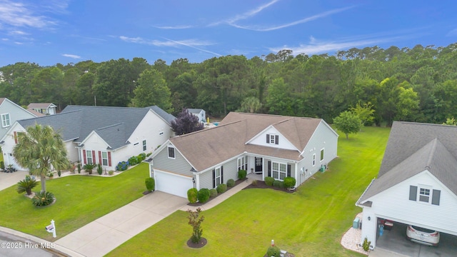 5170 Swashbuckler Way, Southport, NC 28461 - aerial view of property and surrounding area featuring a forest