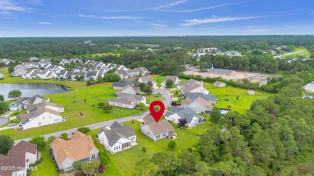 5170 Swashbuckler Way, Southport, NC 28461 - aerial view of residential area with a nearby body of water and a heavily wooded area