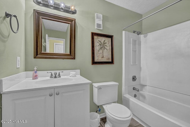 404 S Carolina Beach Ave Unit B7, Carolina Beach, NC 28428 - full bathroom with vanity, shower / bathtub combination, and a textured ceiling