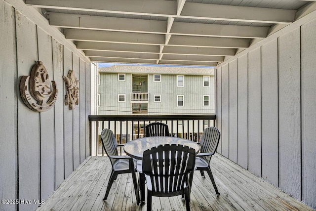 404 S Carolina Beach Ave Unit B7, Carolina Beach, NC 28428 - wooden terrace with outdoor dining space