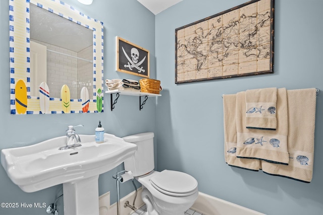 401 Fire Fly Ln, Southport, NC 28461 - full bathroom with toilet and baseboards