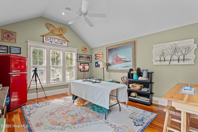 401 Fire Fly Ln, Southport, NC 28461 - home office with lofted ceiling, ceiling fan, wood finished floors, and baseboards