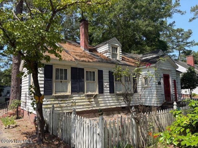1041 Lafayette Ave, Rocky Mount, NC 27803 - view of front of house featuring crawl space and a chimney