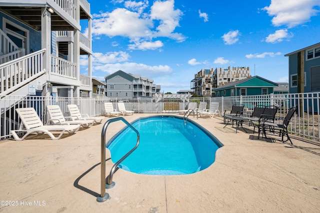community pool featuring a patio