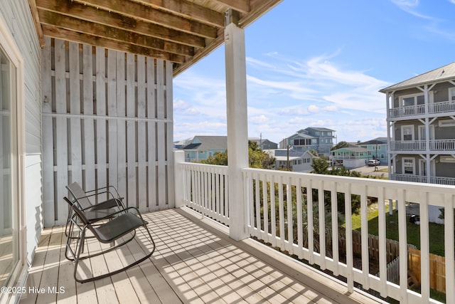 balcony featuring a residential view