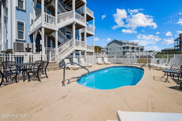 community pool with a patio