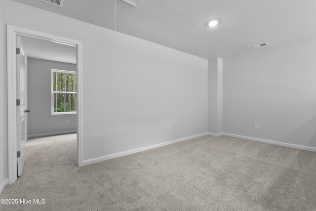 796 Palm Frond Way Unit 47, Calabash, NC 28467 - carpeted empty room featuring attic access and baseboards