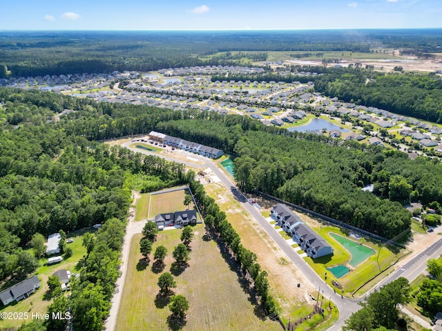 796 Palm Frond Way Unit 47, Calabash, NC 28467 - drone / aerial view of a heavily wooded area and a large body of water