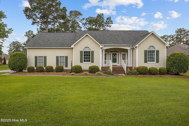 202 Nyon Ct, New Bern, NC 28562 - ranch-style house featuring a front lawn and roof with shingles