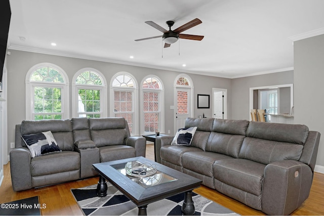 224 Red Fox Run Dr, Wallace, NC 28466 - living room with light wood finished floors, ceiling fan, recessed lighting, crown molding, and baseboards