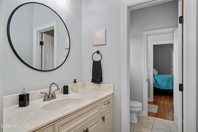 224 Red Fox Run Dr, Wallace, NC 28466 - bathroom featuring toilet, tile patterned flooring, vanity, and ensuite bathroom