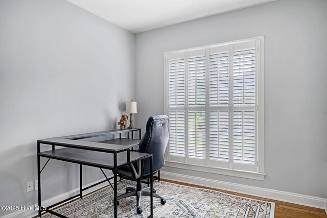 224 Red Fox Run Dr, Wallace, NC 28466 - office area with baseboards and wood finished floors