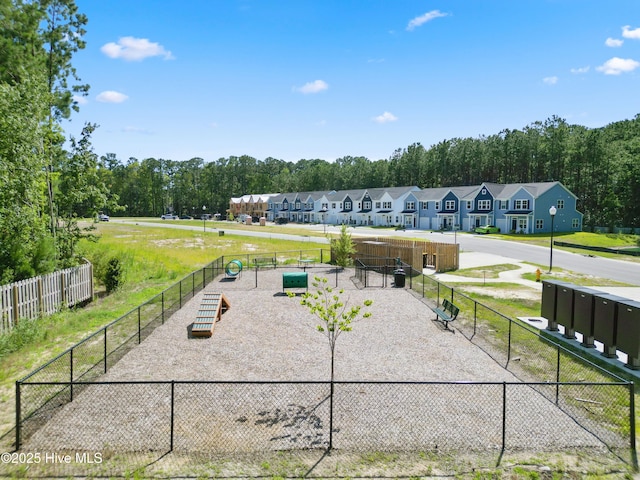 786 Palm Frond Way Unit 51, Calabash, NC 28467 - view of home's community with a dog friendly area, a residential view, and view of wooded area