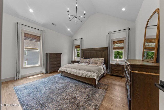 499 Longleaf Dr, West End, NC 27376 - bedroom featuring a chandelier, light wood-type flooring, recessed lighting, and high vaulted ceiling
