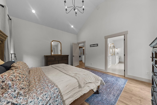 499 Longleaf Dr, West End, NC 27376 - bedroom featuring high vaulted ceiling, a chandelier, light wood-style flooring, baseboards, and recessed lighting