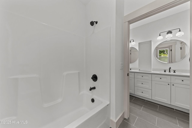 499 Longleaf Dr, West End, NC 27376 - full bath featuring vanity, tile patterned floors, baseboards, and  shower combination