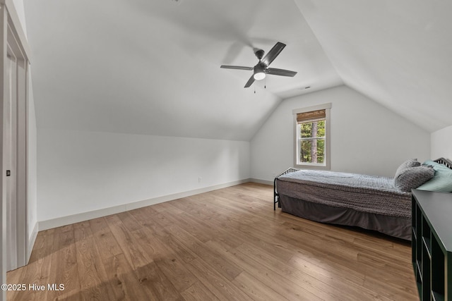 499 Longleaf Dr, West End, NC 27376 - bedroom with wood finished floors, lofted ceiling, ceiling fan, and baseboards