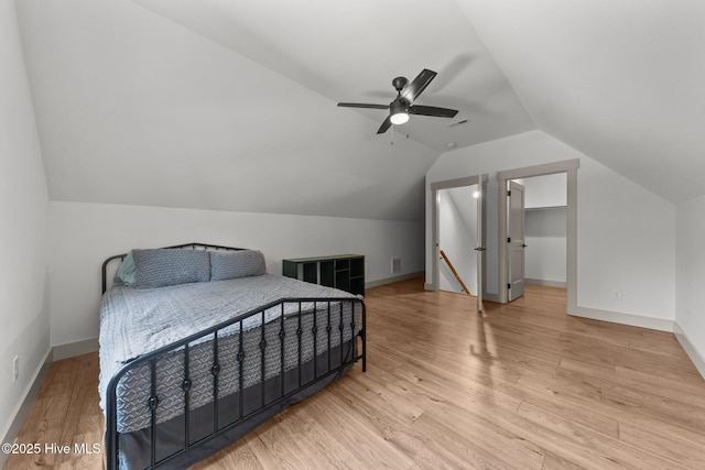 499 Longleaf Dr, West End, NC 27376 - bedroom featuring lofted ceiling, light wood-style floors, baseboards, and a ceiling fan