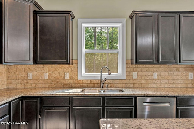 472 Landsdowne Cir, Hampstead, NC 28443 - kitchen with dishwasher, a sink, decorative backsplash, and light stone counters
