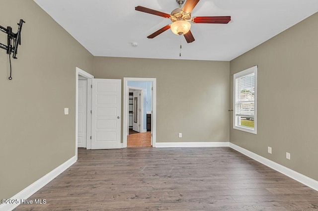 472 Landsdowne Cir, Hampstead, NC 28443 - unfurnished room with a ceiling fan, wood finished floors, and baseboards