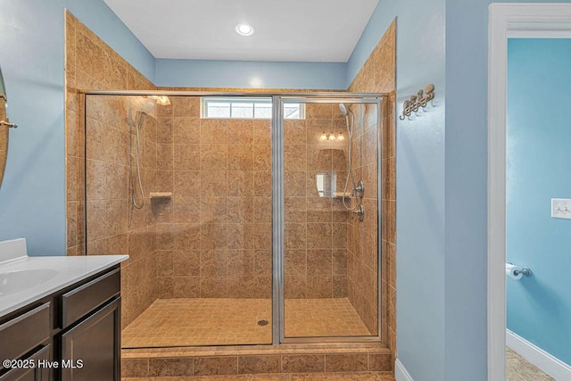 472 Landsdowne Cir, Hampstead, NC 28443 - full bathroom with a stall shower, vanity, baseboards, and recessed lighting