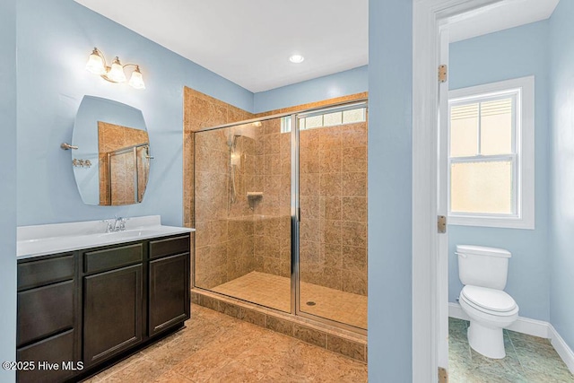 472 Landsdowne Cir, Hampstead, NC 28443 - bathroom with a stall shower, vanity, toilet, and tile patterned flooring