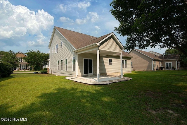 472 Landsdowne Cir, Hampstead, NC 28443 - back of house featuring a patio and a yard