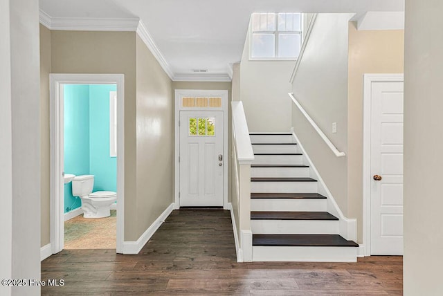 472 Landsdowne Cir, Hampstead, NC 28443 - entrance foyer with ornamental molding, stairway, wood finished floors, and baseboards