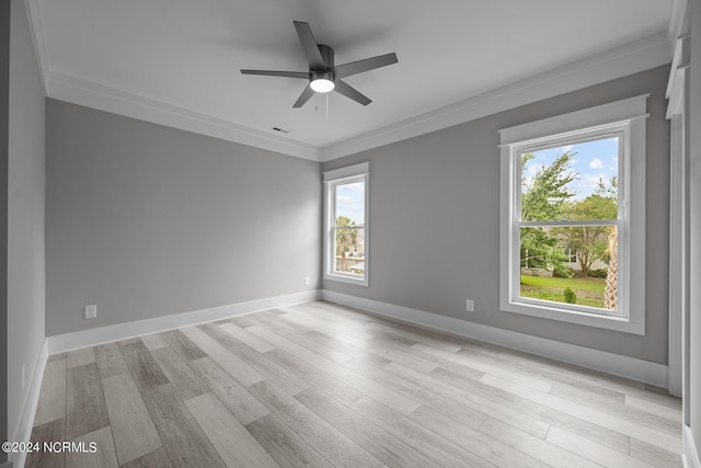 505 N Shore Dr, Sneads Ferry, NC 28460 - spare room with plenty of natural light, a ceiling fan, light wood-style flooring, baseboards, and ornamental molding
