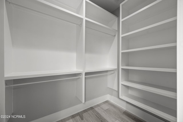 505 N Shore Dr, Sneads Ferry, NC 28460 - walk in closet with wood finished floors
